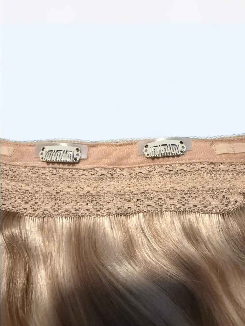 Blonde Wavy Clip-In Extensions with Subtle Ombré Effect